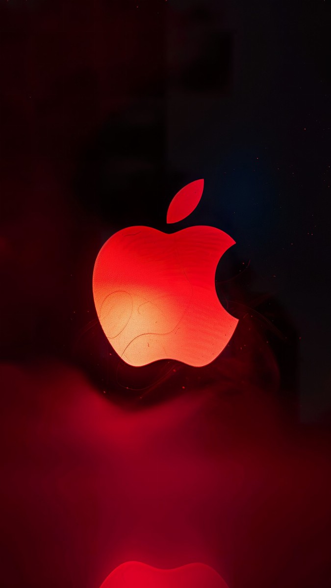 Bright crimson apple silhouette on neutral background