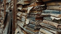 Explore an Ancient Library with Dusty Tomes Wallpaper