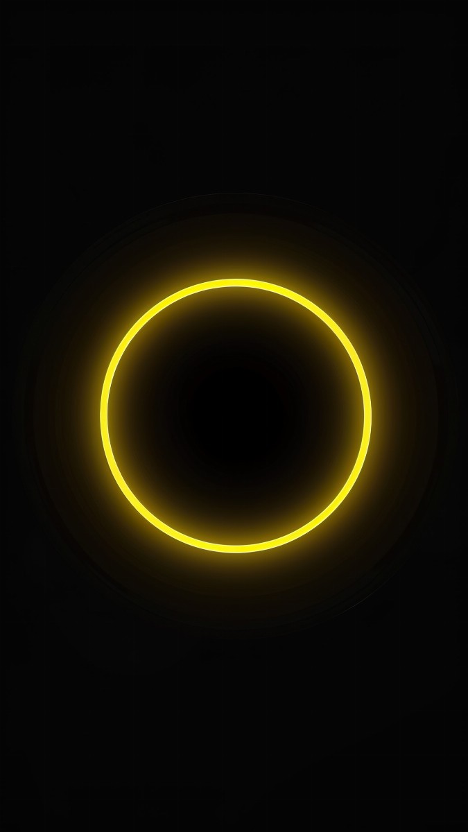 Bright neon yellow circle on a black background