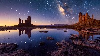 Reflective Pools Under a Starlit Sky Wallpaper